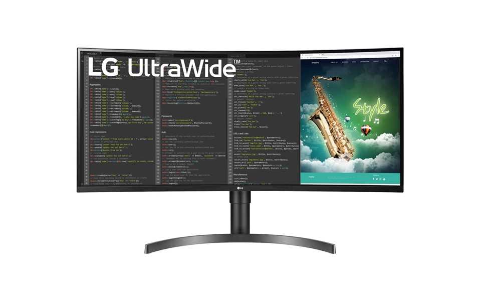 The LG UltraWide monitor showing javascript text and an image of a saxophone.