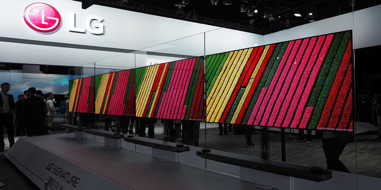 A image of new LG OLED TV lined up in a transparent panel