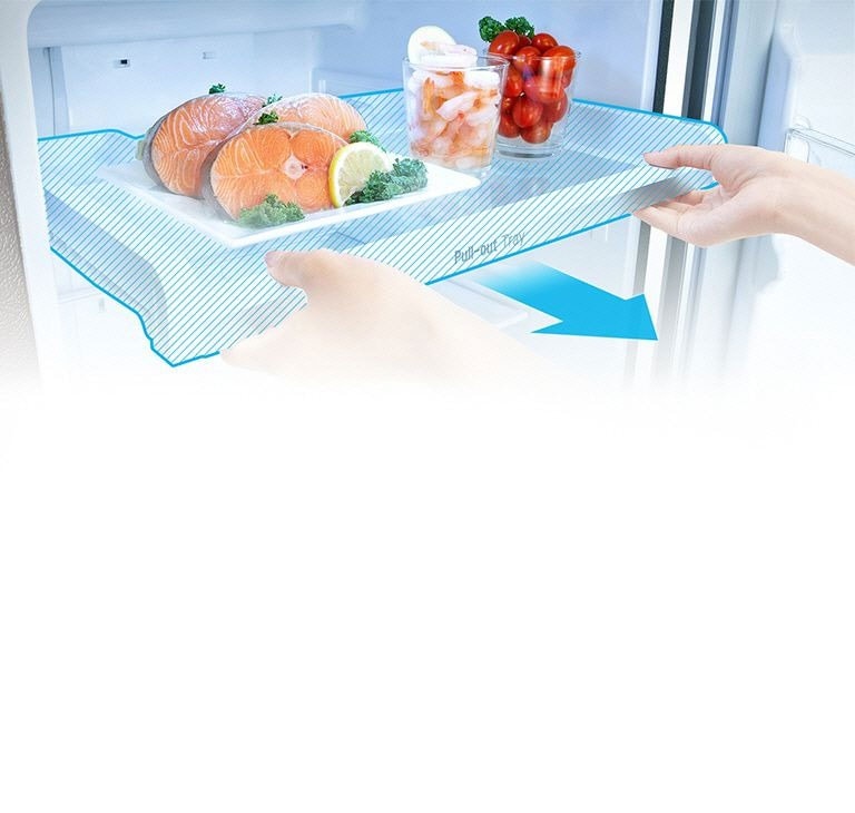 Image of a person taking out a pull-out tray of a refrigerator