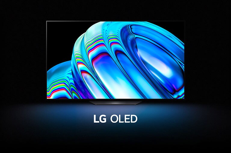 Un tipar abstract de val albastru umple ecranul, apoi se îndepărtează treptat pentru a prezenta LG OLED B2. Ecranul se face negru, apoi afișează din nou tiparul de val cu cuvintele „LG OLED” dedesubt.