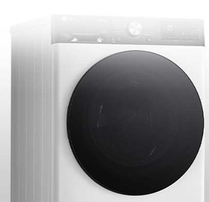 Aceasta este o imagine mărită a butonului metalic de pe panoul unei mașini de spălat.