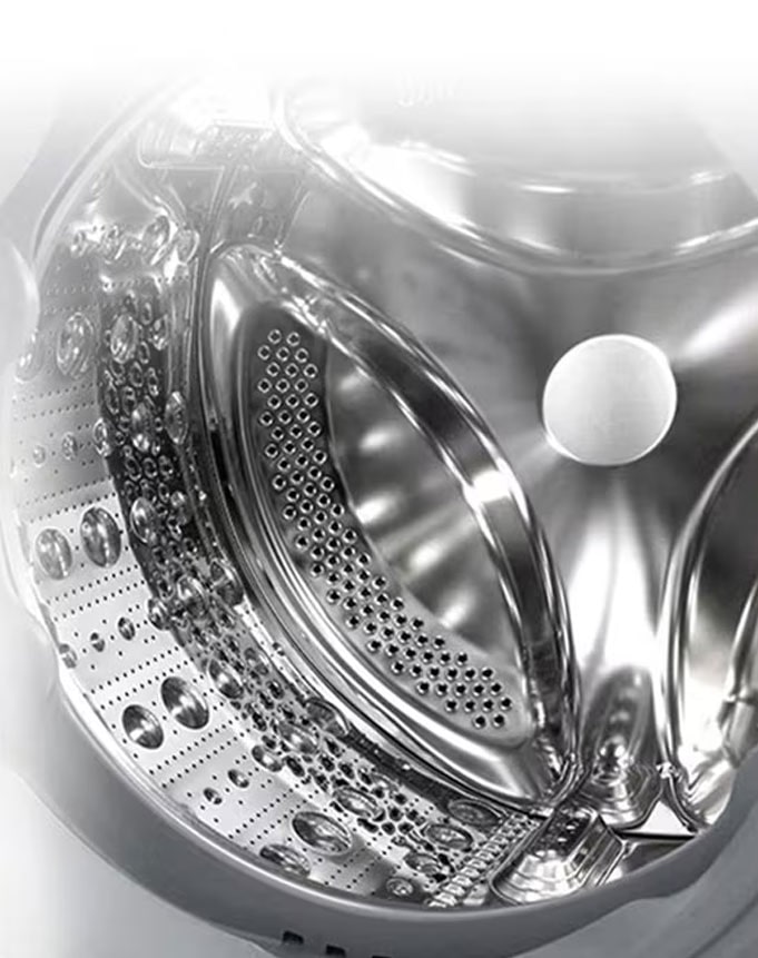 Imaginea din interiorul mașinii de spălat unde se poate vedea ridicătorul din oțel inoxidabil.