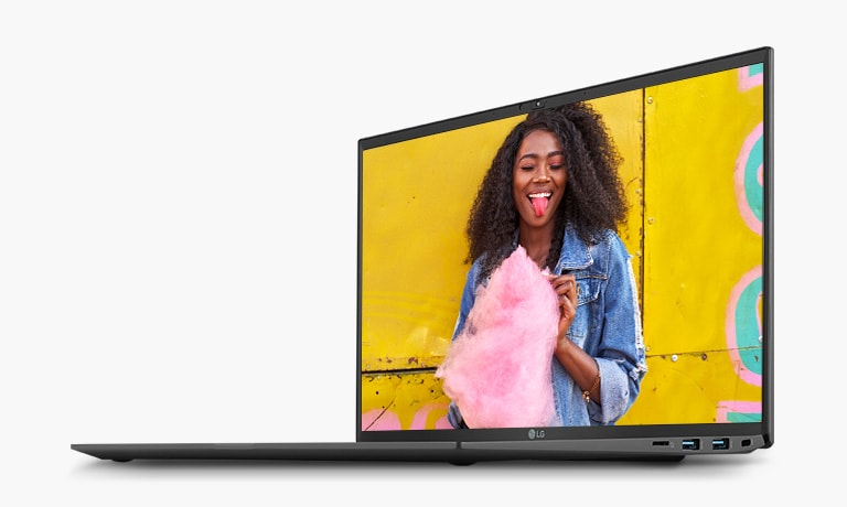 Acesta arată produsul cu vizualizarea ecranului pe care este afișată o femeie care ține o vată de zahăr roz în fața peretelui galben, pentru a exprima expresiile de culoare detaliate ale afișajului IPS.