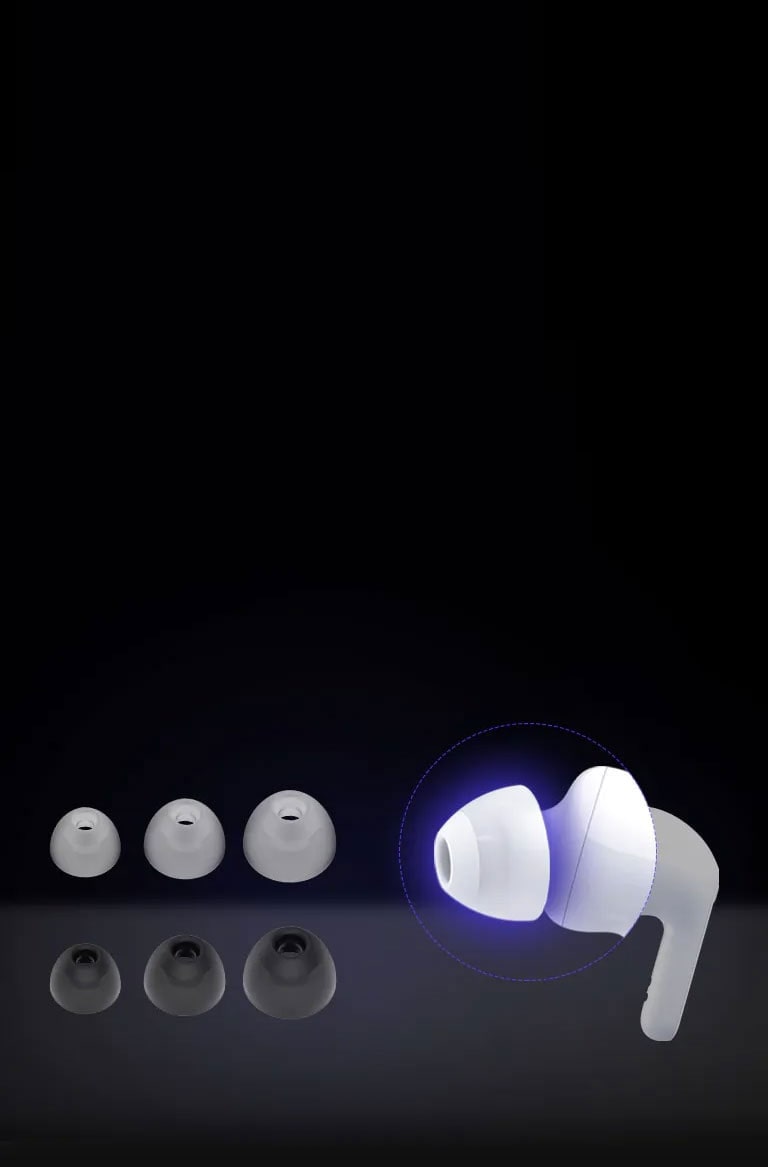 O imagine a unei căști intraauriclare de culoare albă și a două seturi de geluri pentru urechi de trei dimensiuni diferite.