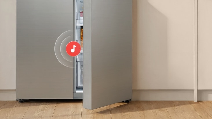 imagine care prezinta un frigider cu functia de alarma usa