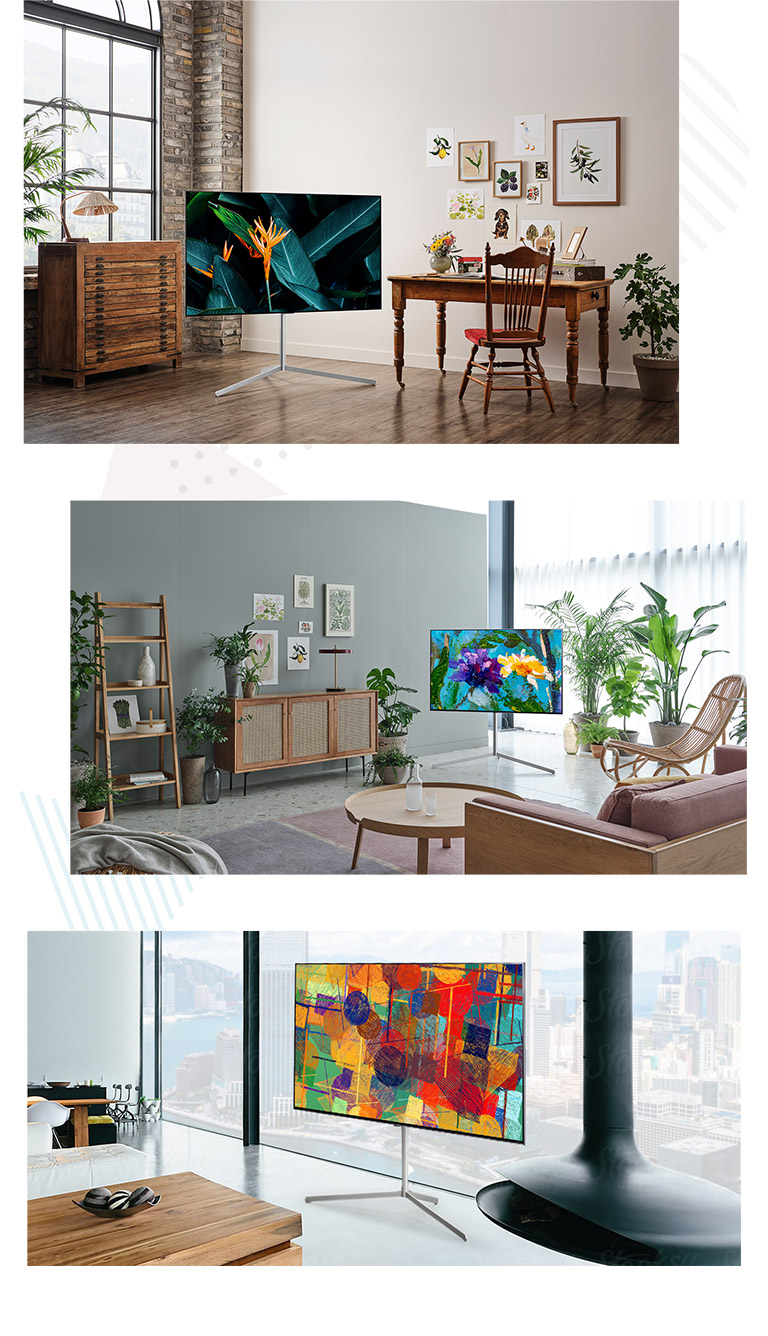 Televizorul stă pe podea cu propriul suport într-o cameră înconjurată de mobilier și decor din lemn. Televizorul într-un interior modern, plin de plante, este amplasat pe podea, folosind propriul suport. Televizor într-un interior modern lângă o fereastră, așezat pe podea, folosind propriul suport.