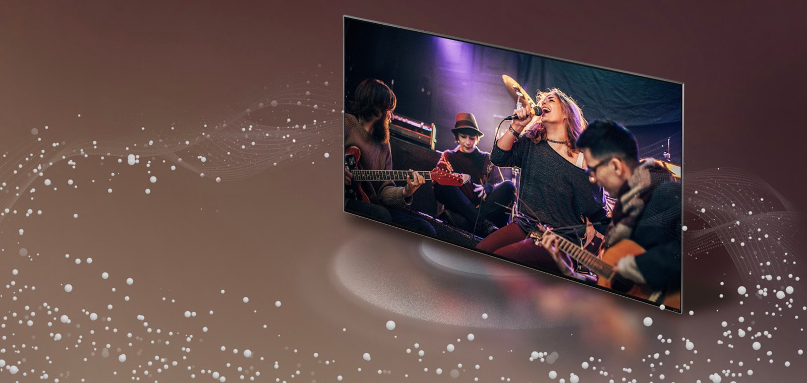 LG TV pe măsură ce bule de sunet și unde sunt emise din ecran și umplu spațiul.