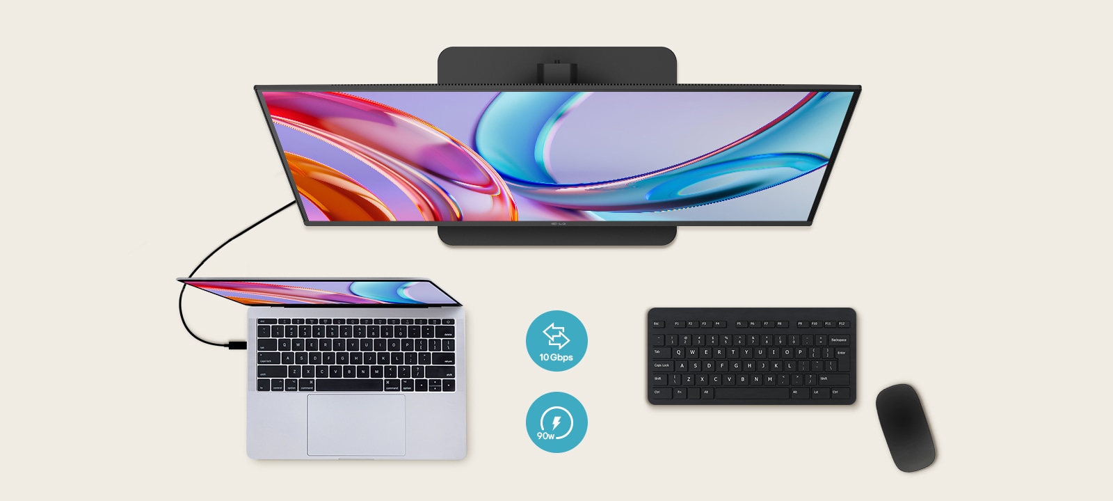 Pogled odozgo na monitor priključen na laptop, s tastaturom i mišem ispod.	