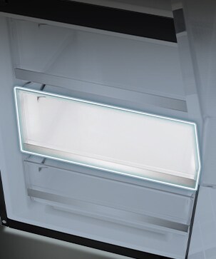 Na slici je prikazan poklopac police u frižideru.