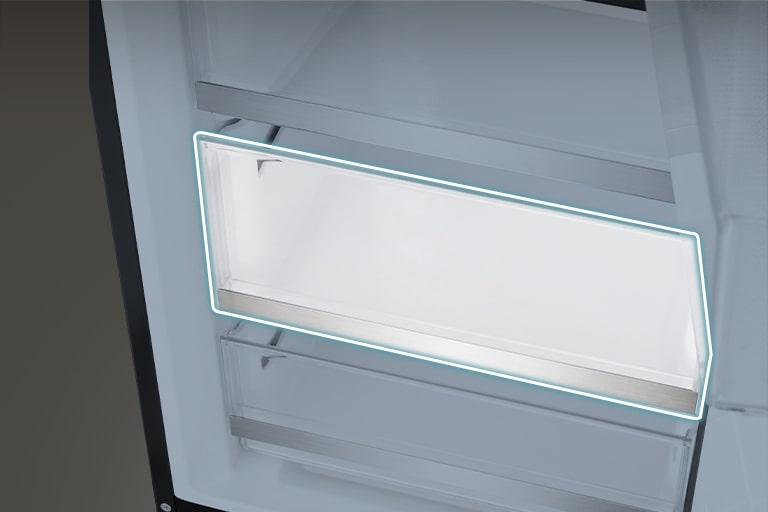 Na slici je prikazan poklopac police u frižideru.