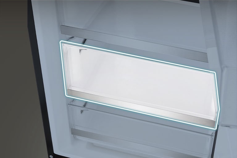 Na slici je prikazan poklopac police u frižideru.