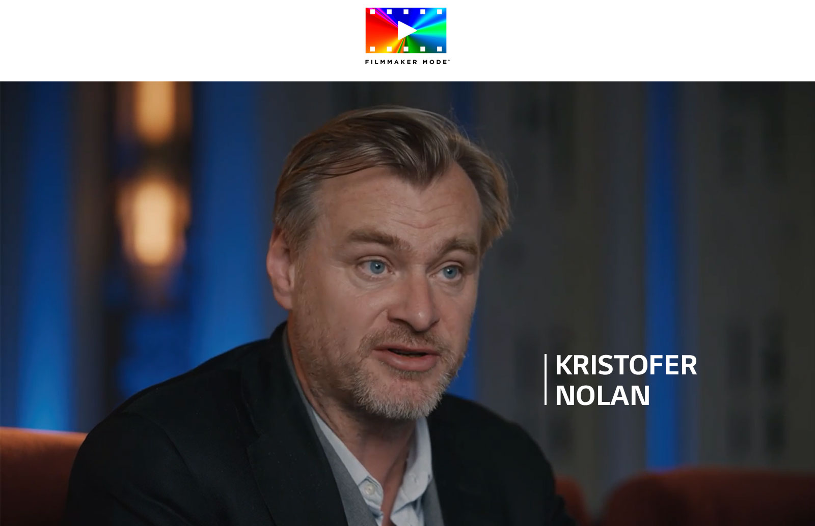 Logotip FILLMAKER MODE™. Ispod logotipa Kristofer Nolan daje intervju u mračnoj prostoriji.