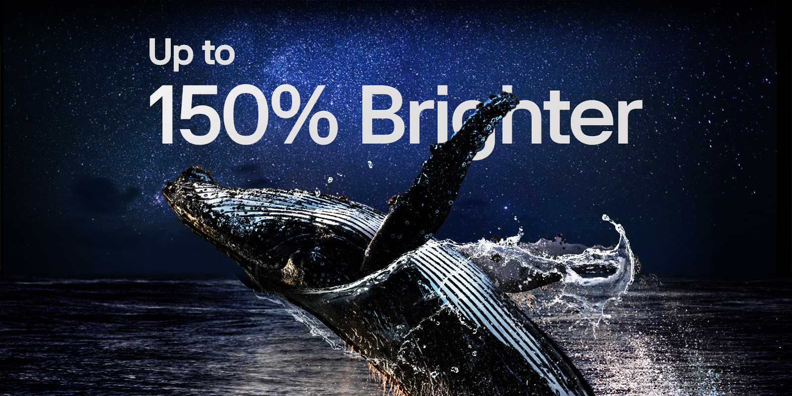 Nepokretna slika ajkule koja iskače iz tmina okeana pod zvezdanim noćnim nebom, nakon čega se na nebu postepeno prikazuje „Up to 150% brigther” (I do 150% svetliji).