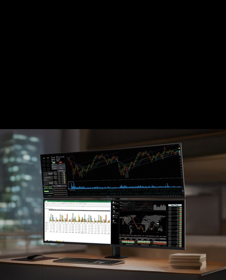 Kancelarija s LG UltraWide monitorom na čijem se velikom ekranu analiziraju kontrolne table s podacima i grafikoni.