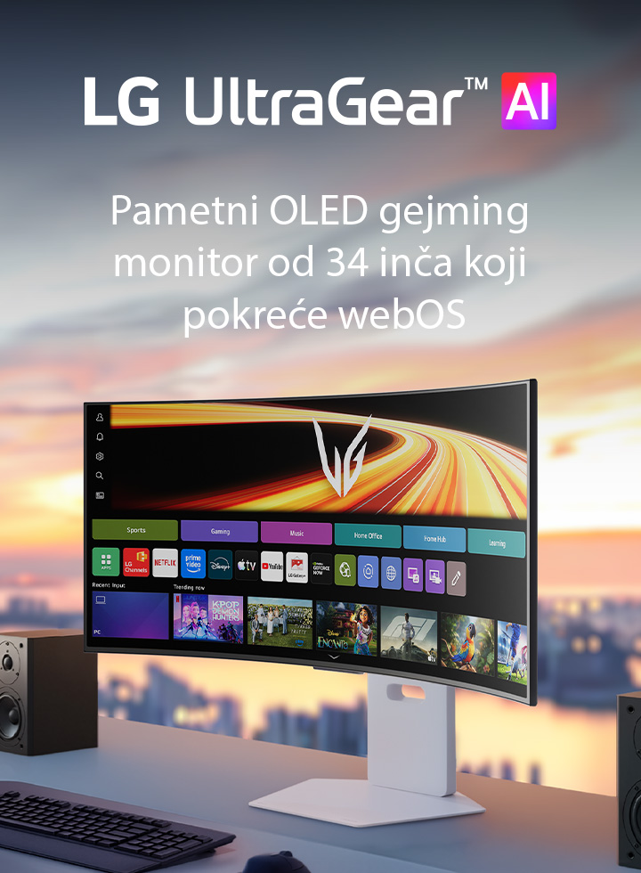 UltraGear™ GX9s OLED gejming monitor prikazuje webOS interfejs na zakrivljenom ekranu, na stolu sa stereo zvučnicima.