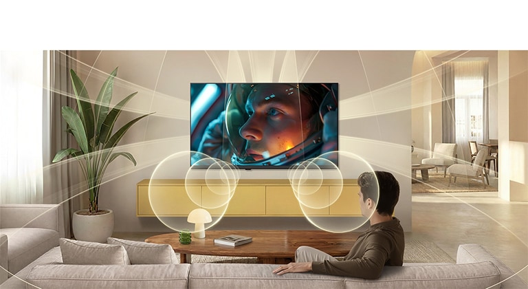 Телевизор LG SMART TV AI LB65 с виртуальными каналами 9.1.2 на базе умного звука наполняет современную гостиную разнонаправленным звуком во время просмотра на экране сцены из фильма про астронавтов, усиливая эффект погружения во всем пространстве.