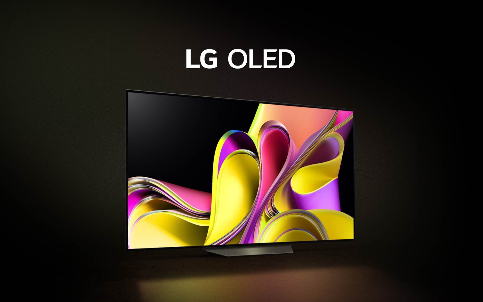 A video opens with the words LG OLED evo in a white font against a black background. The words enlargen and fill with colour. Then the scene transitions to LG OLED G3, showing a colourful abstract artwork. The screen rotates to the side to present the slim edge and then fixes to a wall, representing the One Wall Design.