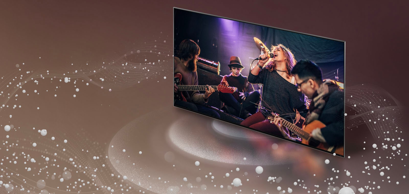 Телевизор LG TV, от экрана которого исходят звуковые пузыри и волны, заполняющие пространство.