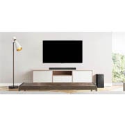 LG Саундбар LG SP7, A  TV, soundbar, and subwoofer placed in a plain living room, SP7, thumbnail 3