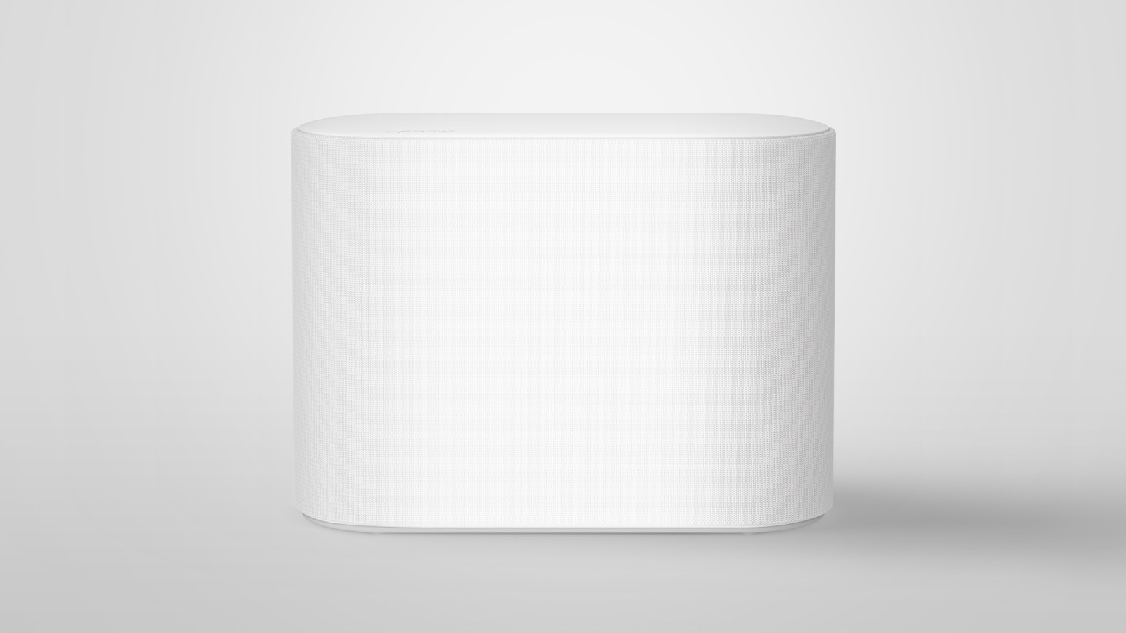 Сабвуфер установлен на белом полу. Сцена меняется, чтобы увеличить два компонента внутри сабвуфера, которые слегка вибрируют, и эффекты звуковых волн, исходящие от двух компонентов. Сцена меняется, чтобы снова уменьшить масштаб и показать внешний вид сабвуфера.