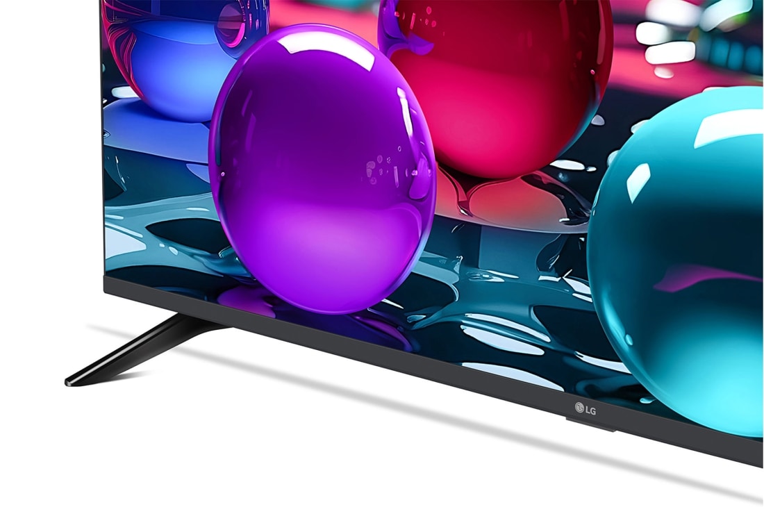 LG Телевизор LG 65UA73006LA 65'' UHD AI 4K 2025, Крупный план подставки телевизора LG UHD UA73. Видна подставка, угол телевизора с рамкой и скринфил со стеклянными сферами. , 65UA73006LA, thumbnail 6