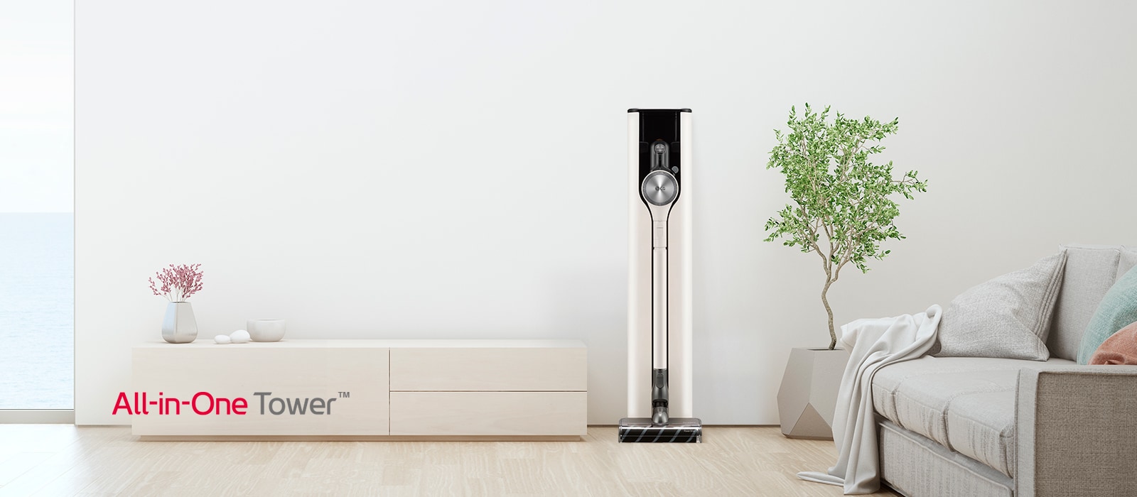 На нем показан фронтальный снимок башни A9 All-in-One в современном интерьере гостиной в белых тонах.