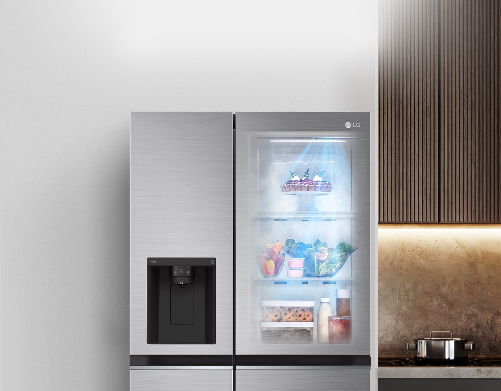 The front view of a black InstaView refrigerator with the light on inside. The contents of the refrigerator can be seen through the InstaView door. Blue rays of light shine down over the contents from the DoorCooling function. 