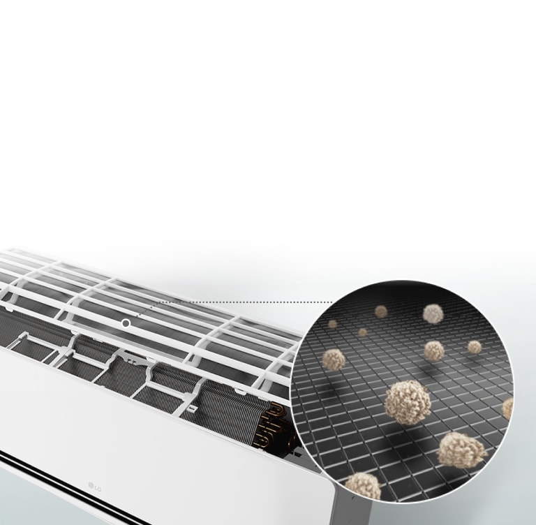 LG air conditioner with open panel showing a pre-filter capturing dust particles in a close-up view.