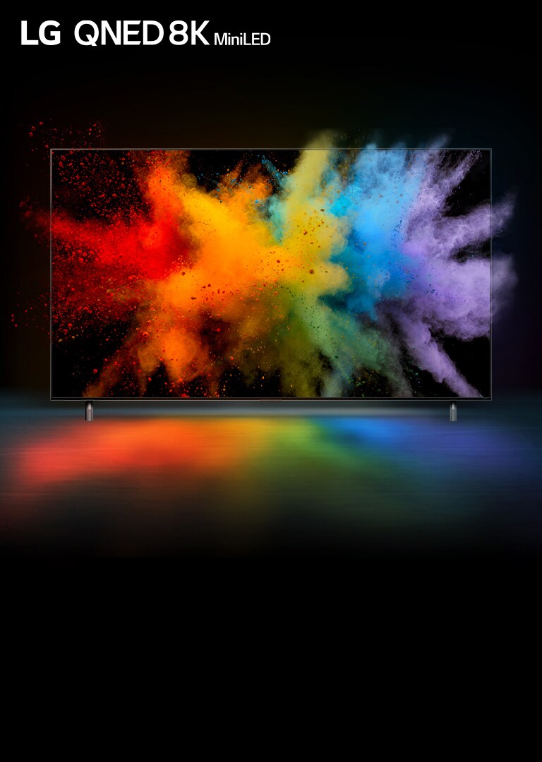 Televízor je zobrazený v čiernom priestore. Na obrazovke televízora vidieť explóziu farebného prášku. 