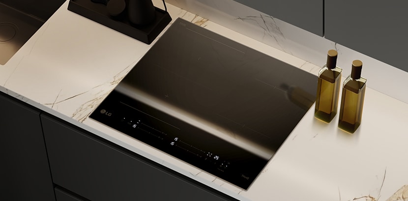 Tento obrázok ukazuje lesklé čierne sklenené prevedenie indukčnej varnej dosky.