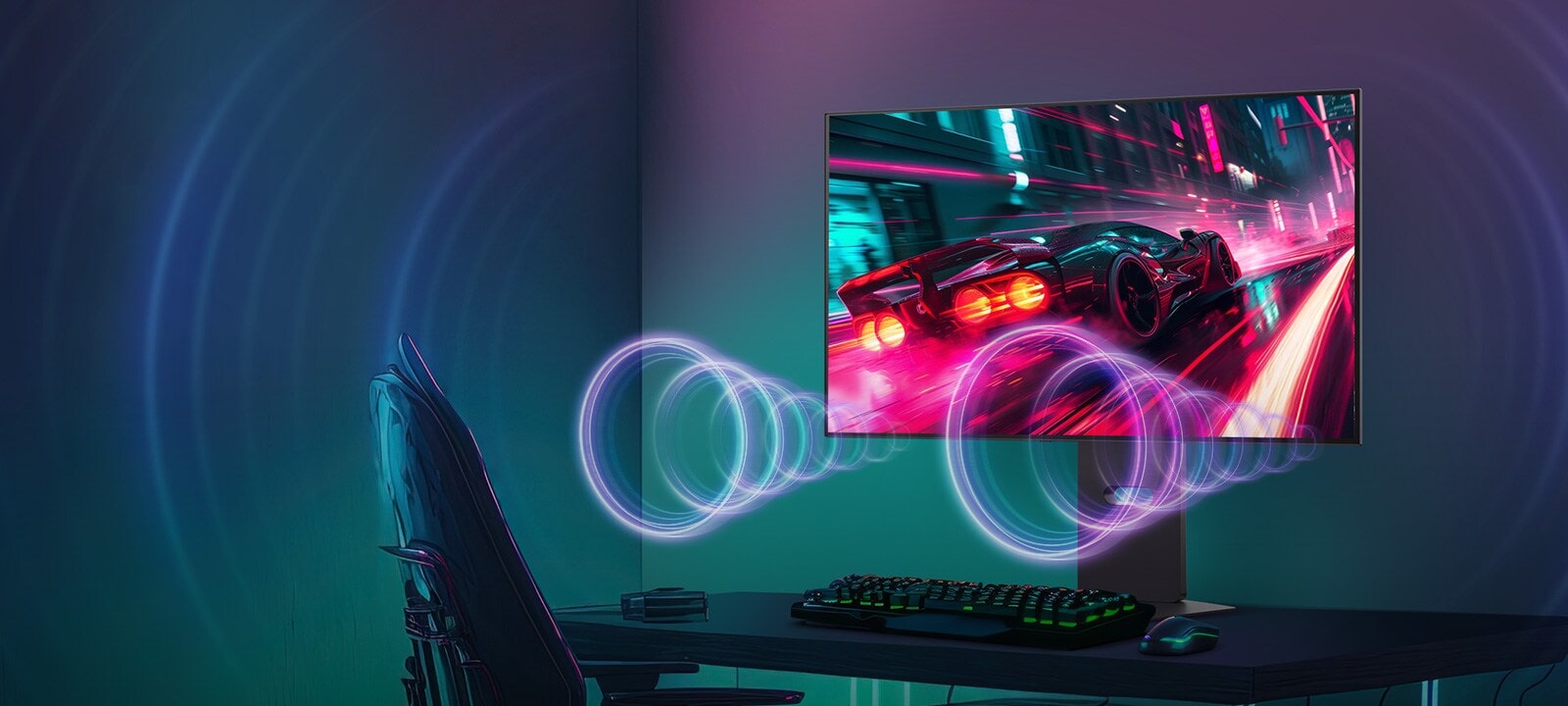 Na obrazovke monitora je pretekárska hra, zatiaľ čo vychádza zvuk z reproduktorov v spodnej časti monitora.