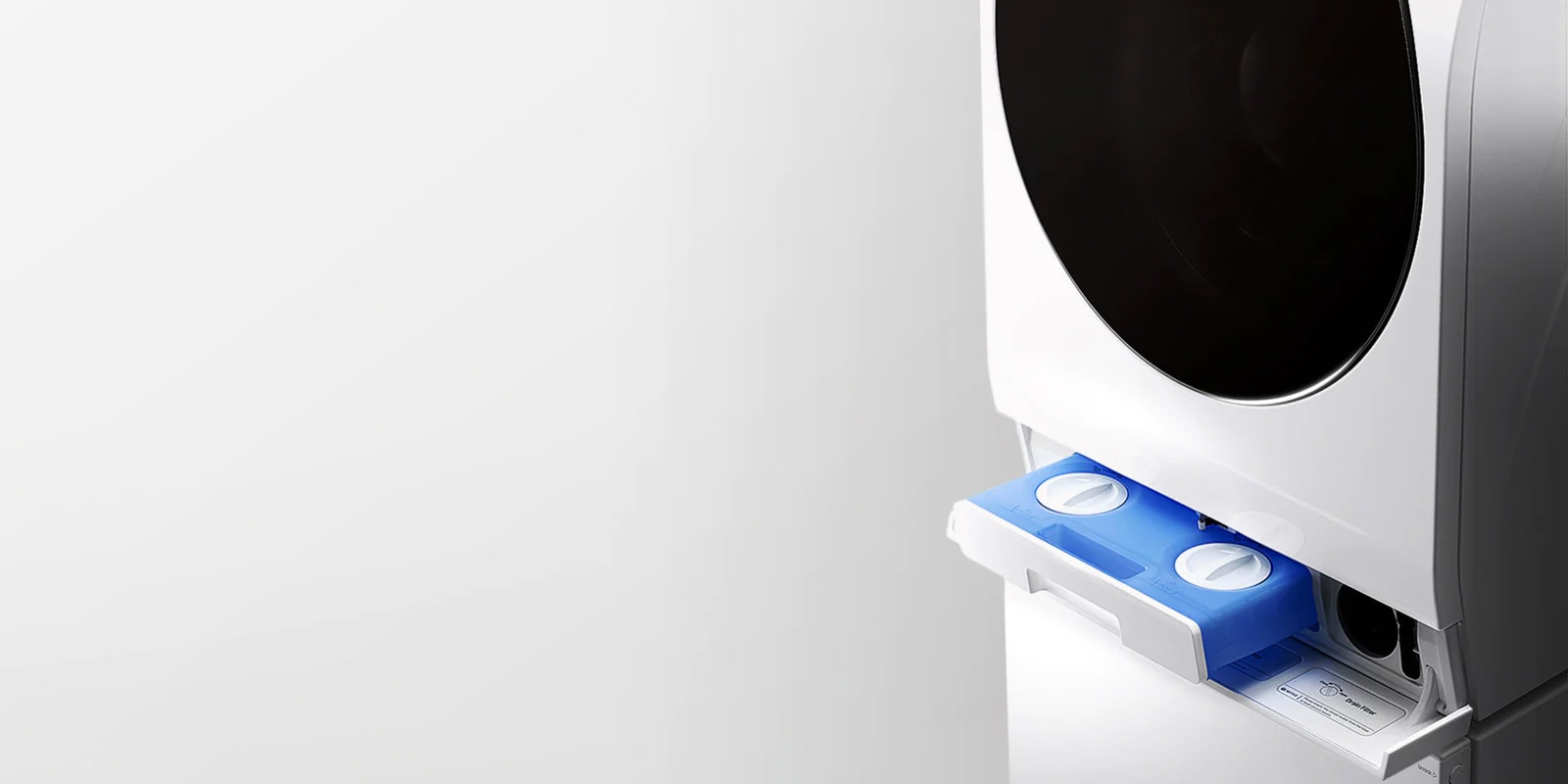 Zobrazuje časť automatického dávkovacieho systému umiestnenú v spodnej časti hlavnej práčky.