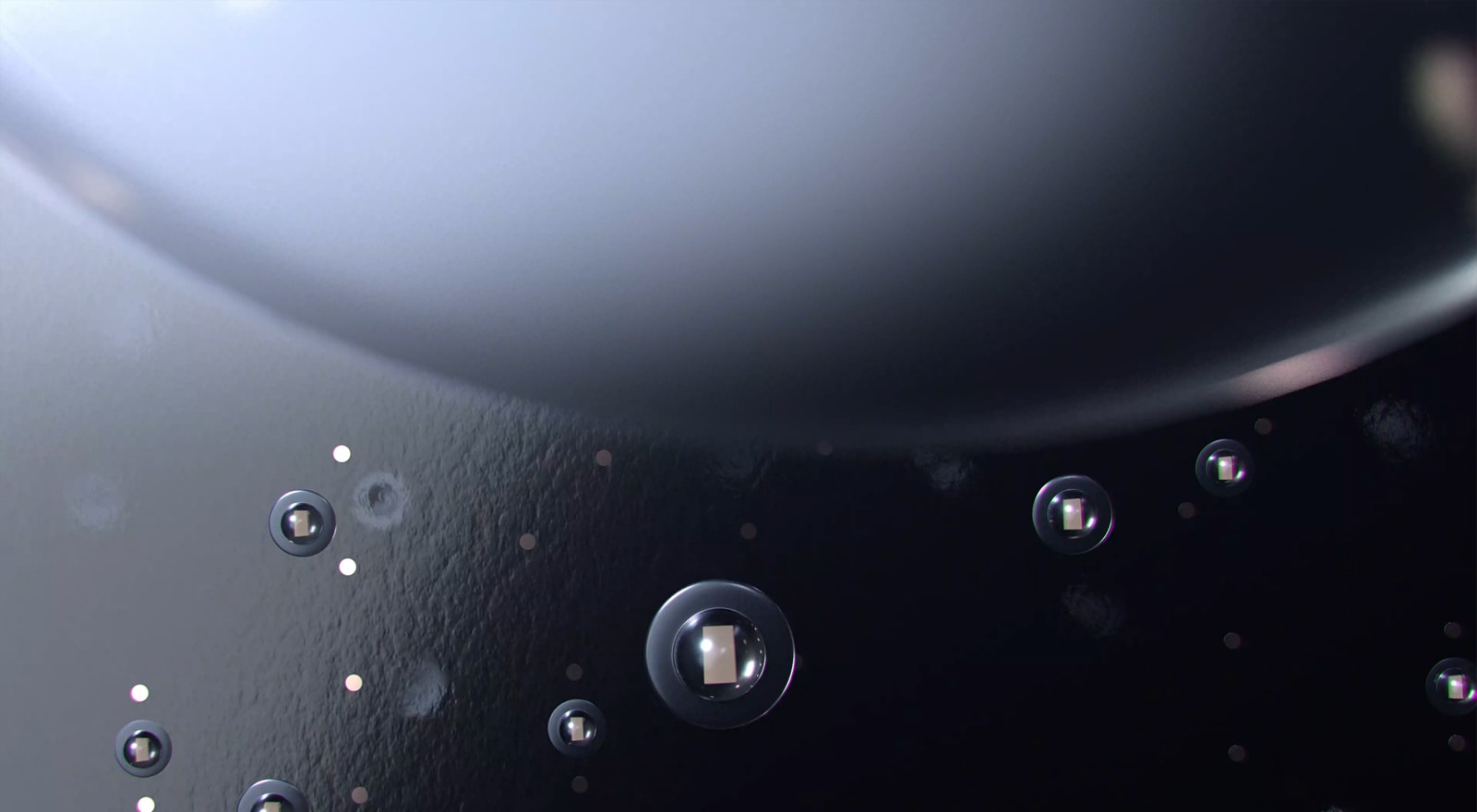 Video zobrazuje drobné Mini LED diódy použité na paneli obrazovky, ktoré sa rozsvecujú. Na konci videa sa zobrazí jasné žiarivé slnko na tmavočiernom pozadí.