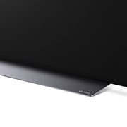 LG 65'' LG OLED evo TV, webOS Smart TV, pohľad zblízka na dvere práčky MiniWash, OLED65CS6LA, thumbnail 8