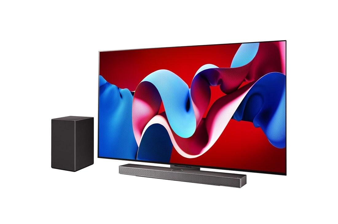 LG 77-palcový LG OLED evo C4 4K Smart TV OLED77C4, Mierne naklonený pravý bočný pohľad na televízor LG OLED evo, OLED C4 so Soundbarom LG pod ním a subwooferom na boku, OLED77C44LA, thumbnail 2