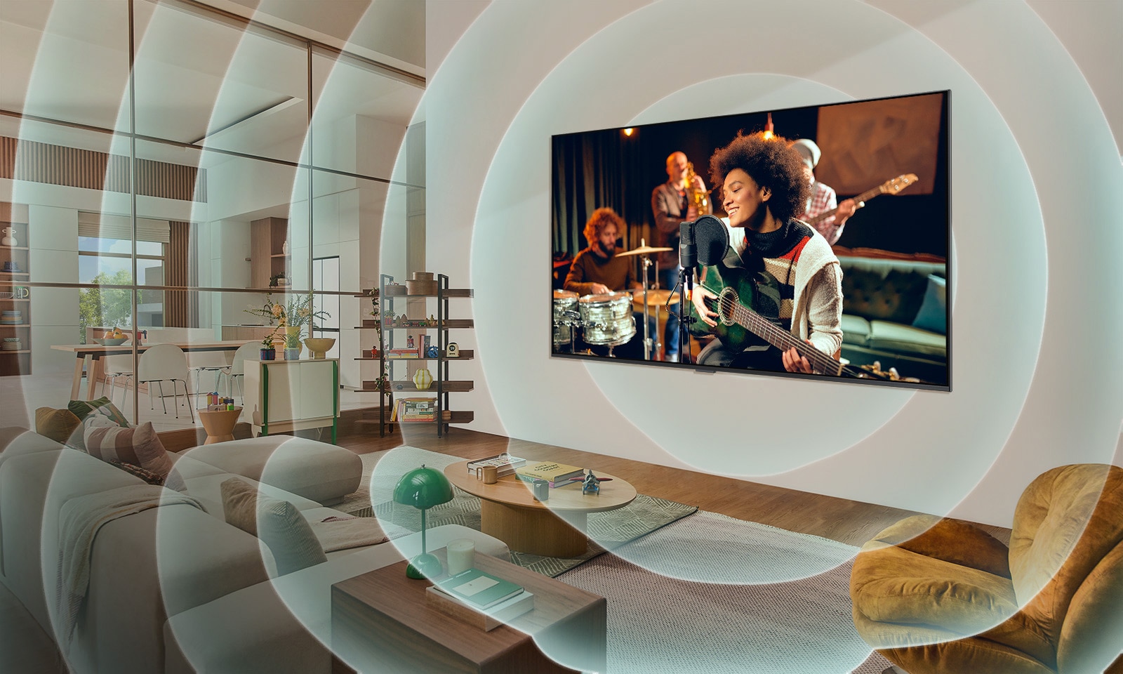 客廳的牆上安裝了 LG TV，螢幕上顯示一名吉他手。代表音波的同心圓圖形。