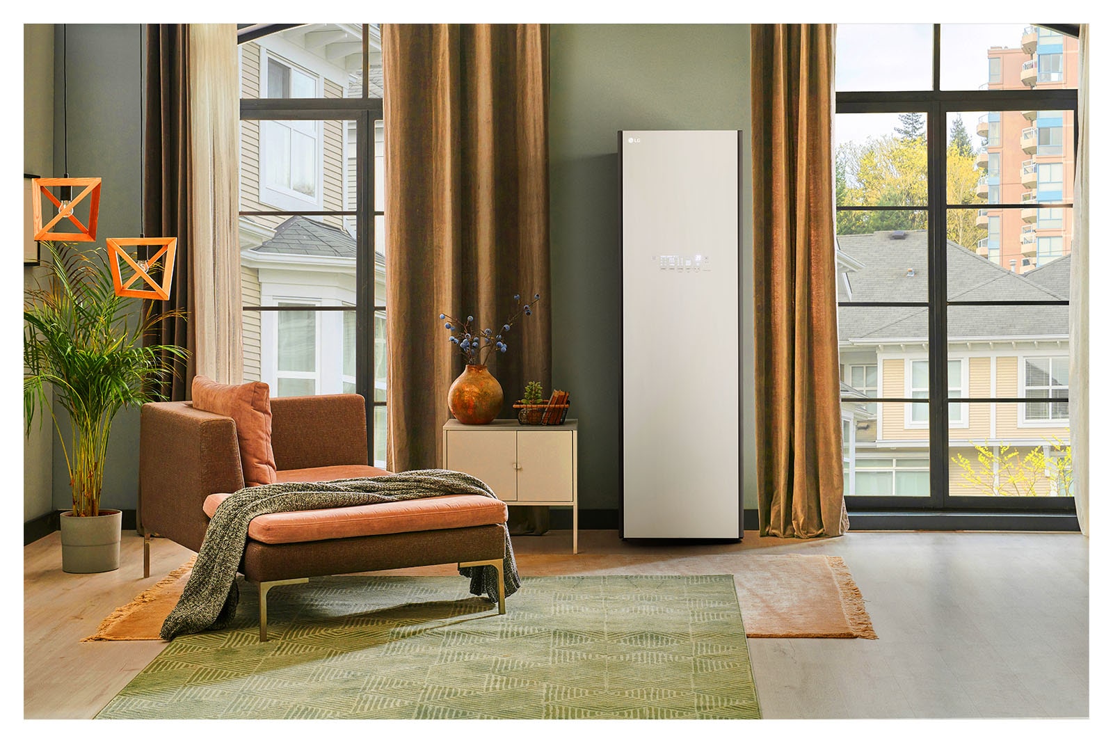 It shows mist beige color LG Styler Objet Collection placed in the dressing room that matches naturally to the furniture around.