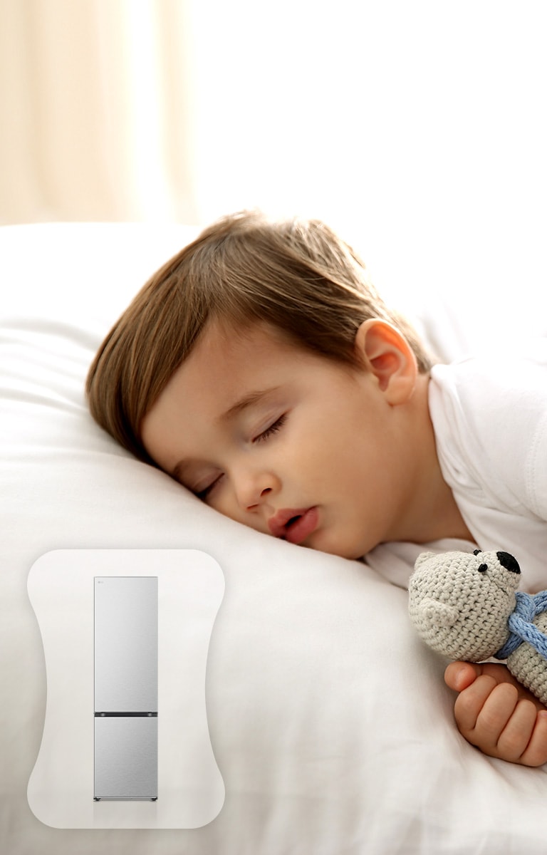 Зображено дитину у ліжку, яка міцно спить.