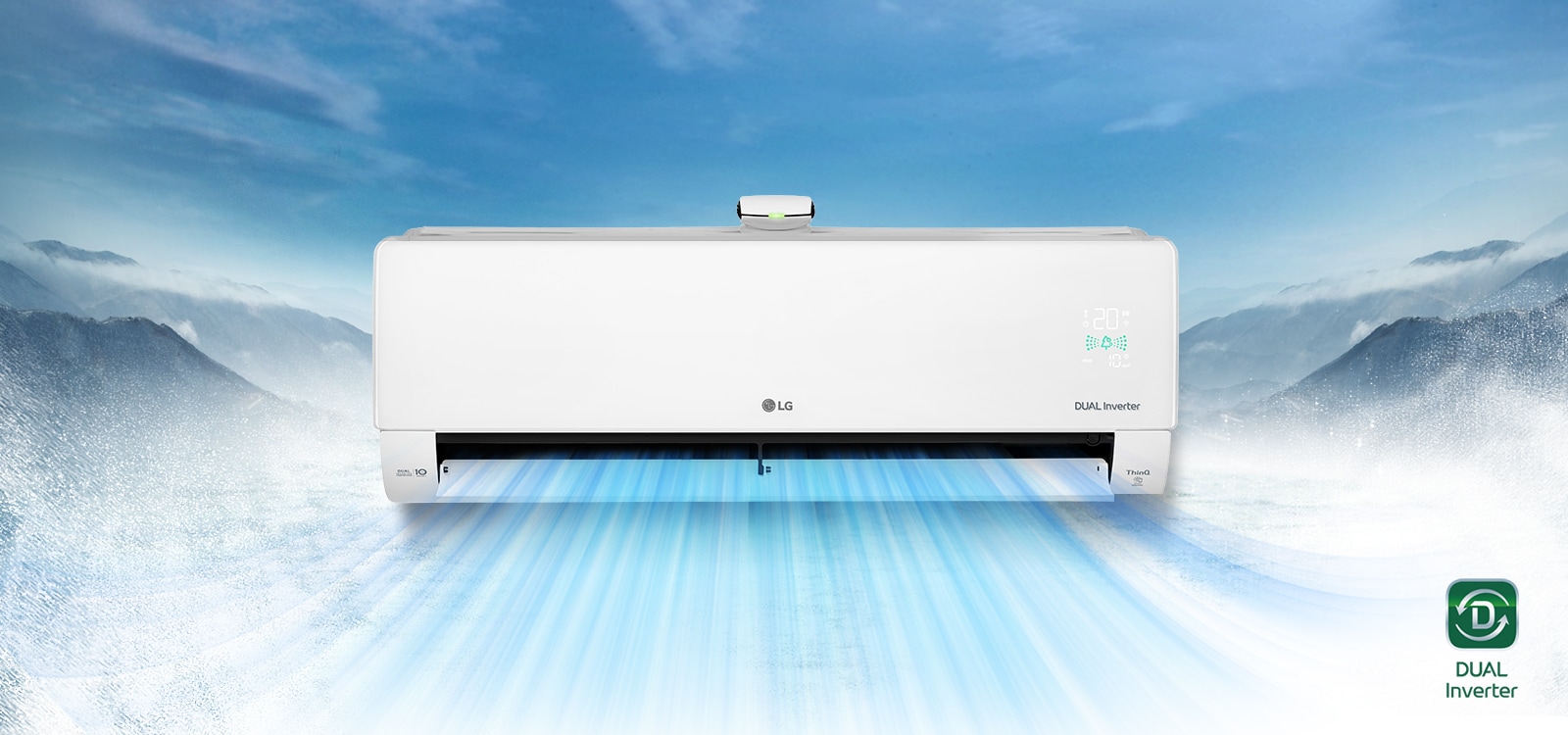 На задньому плані засніжений гірський пейзаж. Вид спереду кондиціонера на передньому плані, повітря виходить із нього. Логотип DUAL Inverter розташований у нижньому правому куті відео.