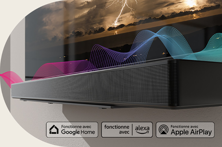 Звукова панель висить на стіні, а телевізор прямо над нею. Звукові хвилі проходять між ними, змінюючи кольори з червоного на синій.