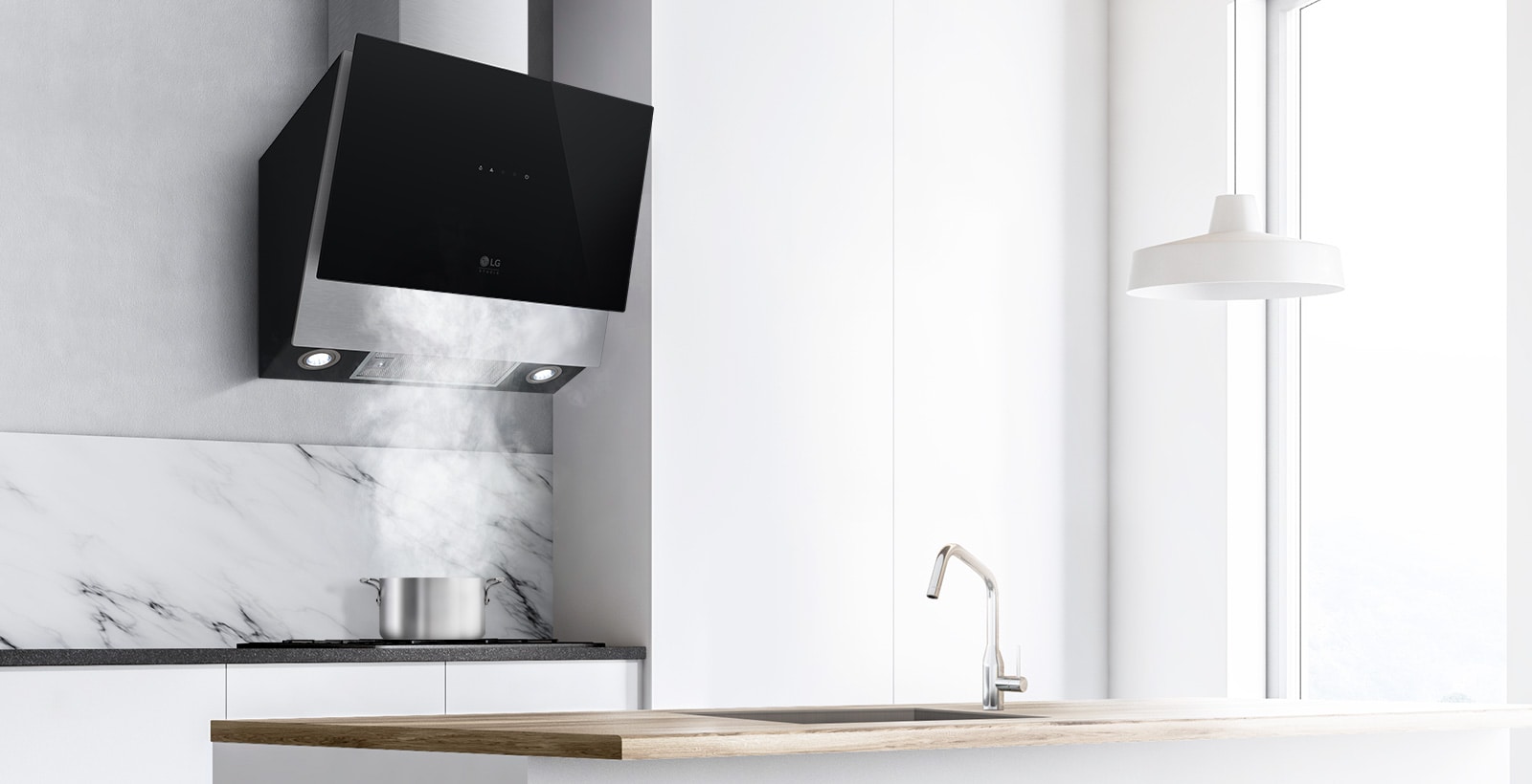 The black hood is shown with lights on the underside on above a steaming pot on the stove.