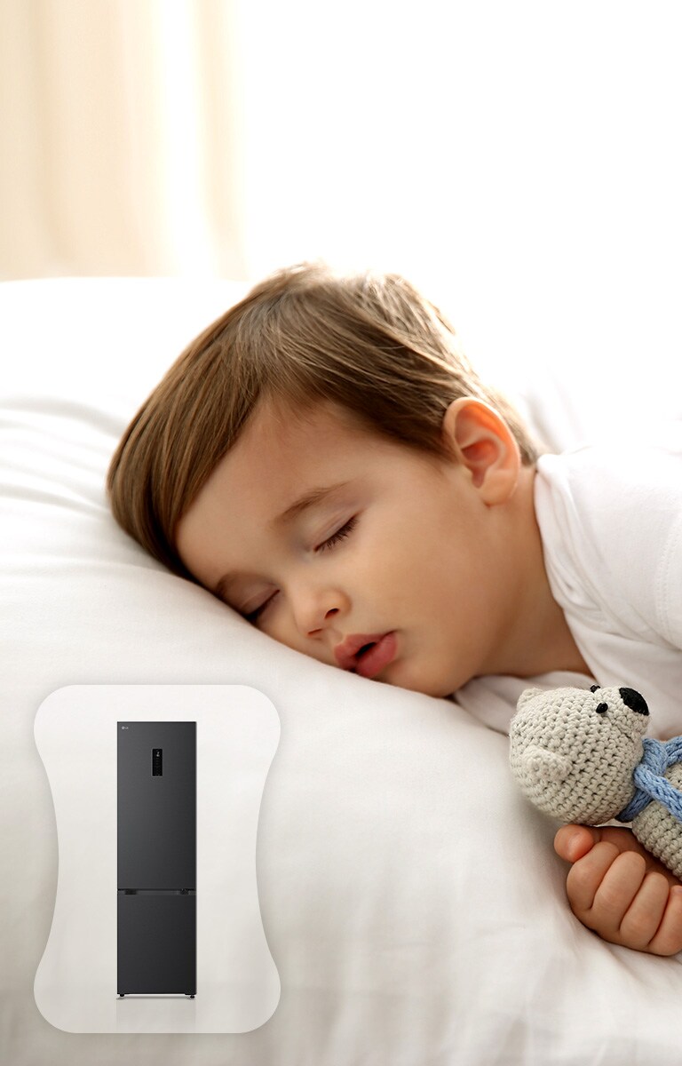 Зображено дитину у ліжку, яка міцно спить.