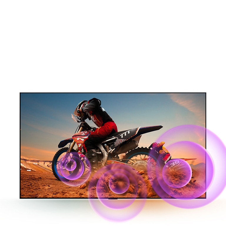 LG OLED TV відображає чоловіка на мотоциклі з фіолетовими абстрактними колами, що виходять з-під керма для візуалізації звукової емісії.