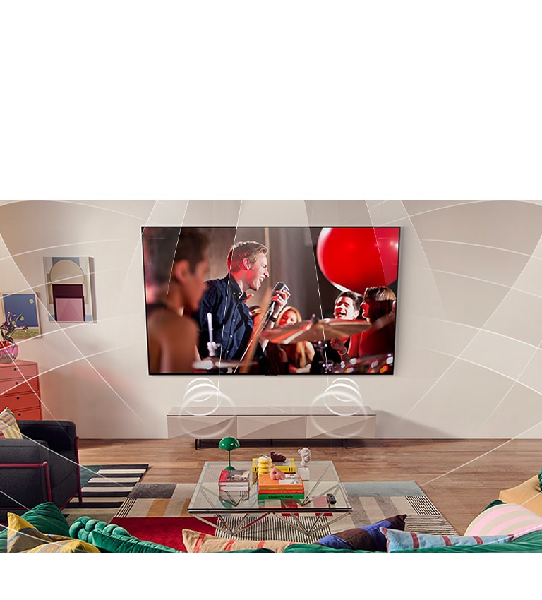 Вітальня з телевізором LG, закріпленим на стіні. Звукові хвилі графічно заповнюють простір, демонструючи, як віртуальні 11.1.2-канали створюють ефект об’ємного звучання для користувача