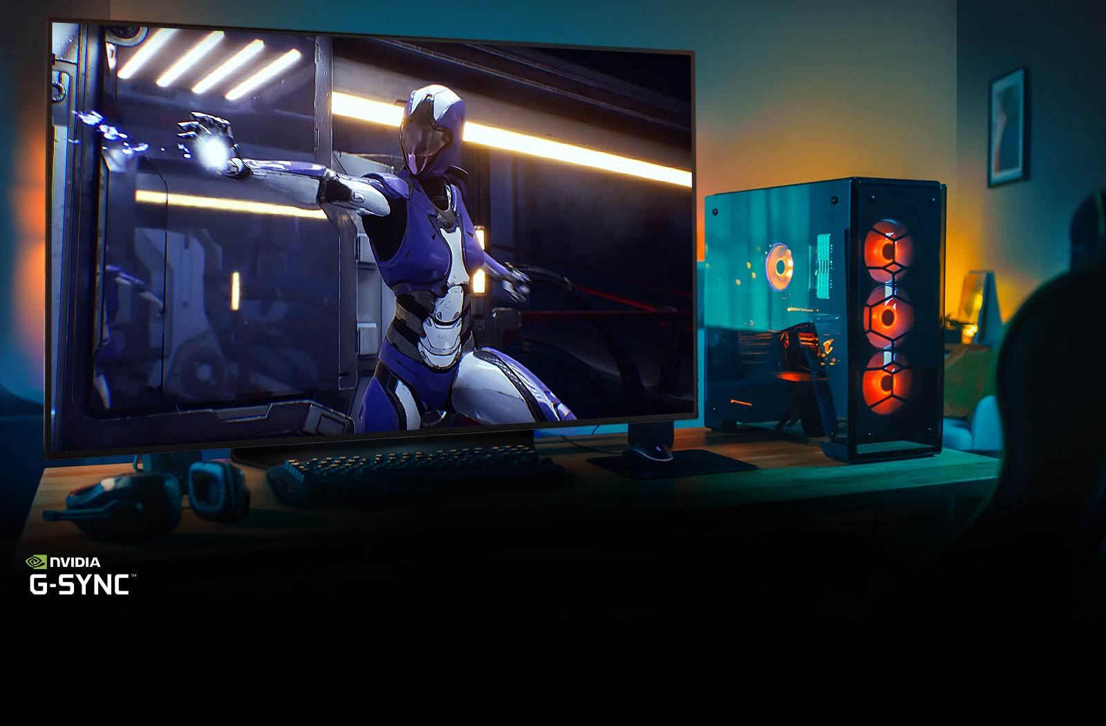 Телевізор зі сценою ігрового персонажа та ПК на столі