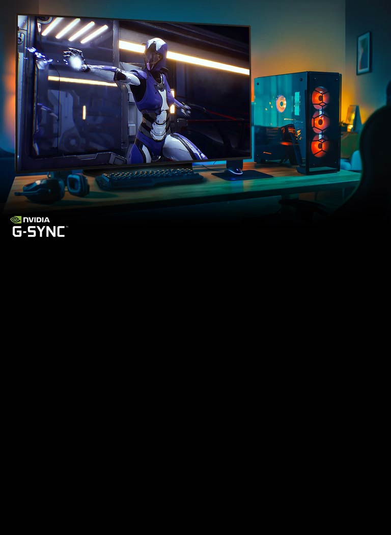 Телевізор зі сценою ігрового персонажа та ПК на столі