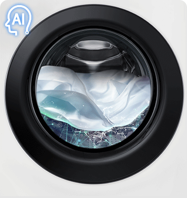 Зображено одяг, що переться, в барабані пральної машини