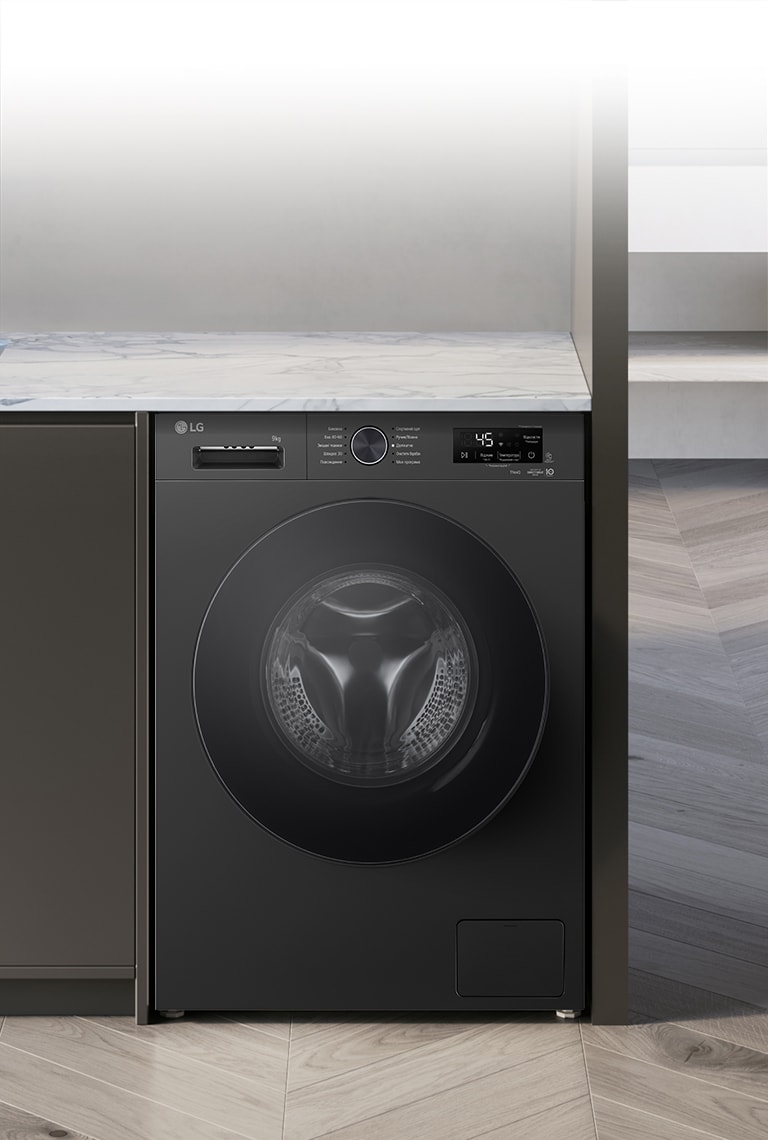 Зображено пральну машину посеред інтер'єру