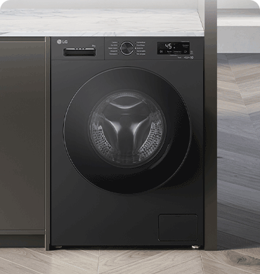 Зображено пральну машину посеред інтер'єру