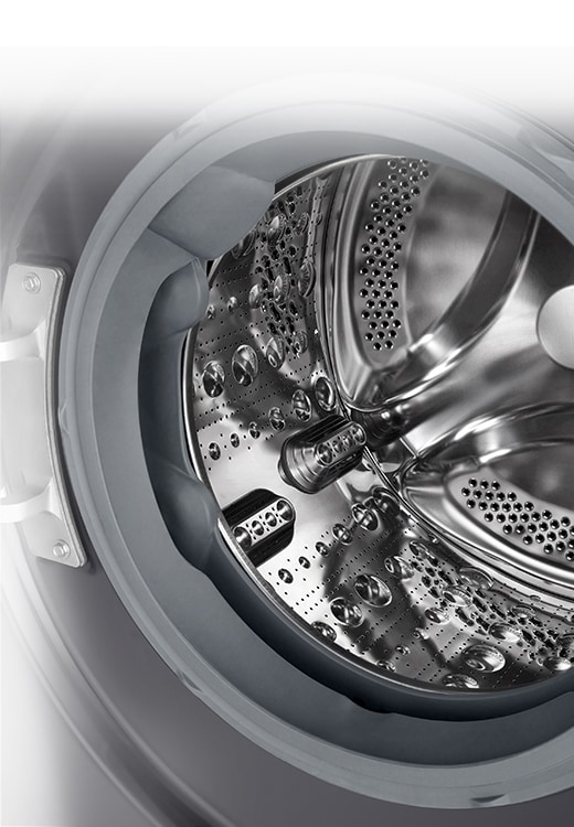 Внутрішнє зображення пральної машини, де можна побачити підйомник з нержавіючої сталі.